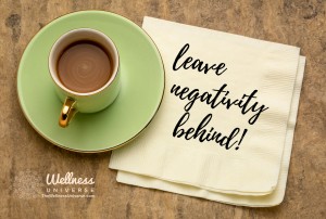 coffee with napkin saying leave negativity behind